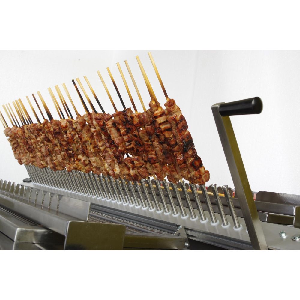 Charcoal grill with rotating mechanism